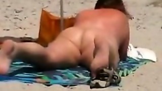 Chubby Grandmother Gets A Tan Vanguard Beach